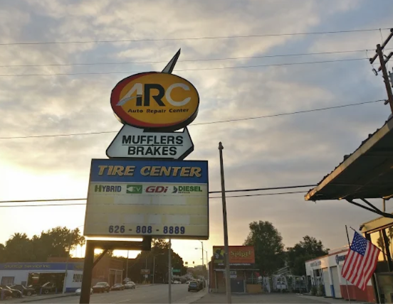 ARC Auto Repair Center sign closeup