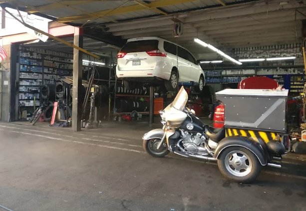 Vehicle on lift in service bay